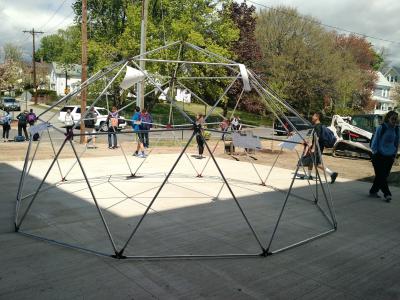 A 20-foot wide geodesic dome outside.