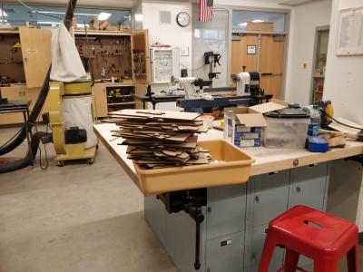 A stack of plywood pieces of a container.