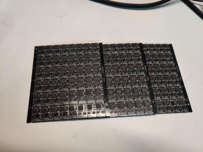 3 panels of conjoined smaller circuit boards.