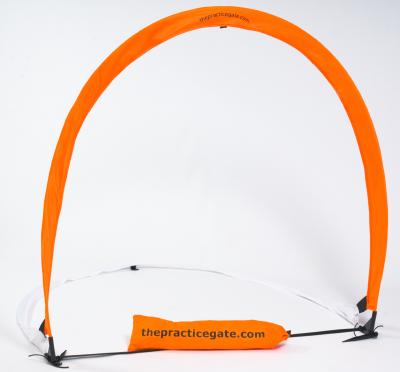 The Practice Gate - an orange and a white arch of fabric, joined at a 90 degree angle, with a carrying pouch in the middle.